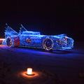 its made out of xmas tree lights and put on a golf cart so it can be driven